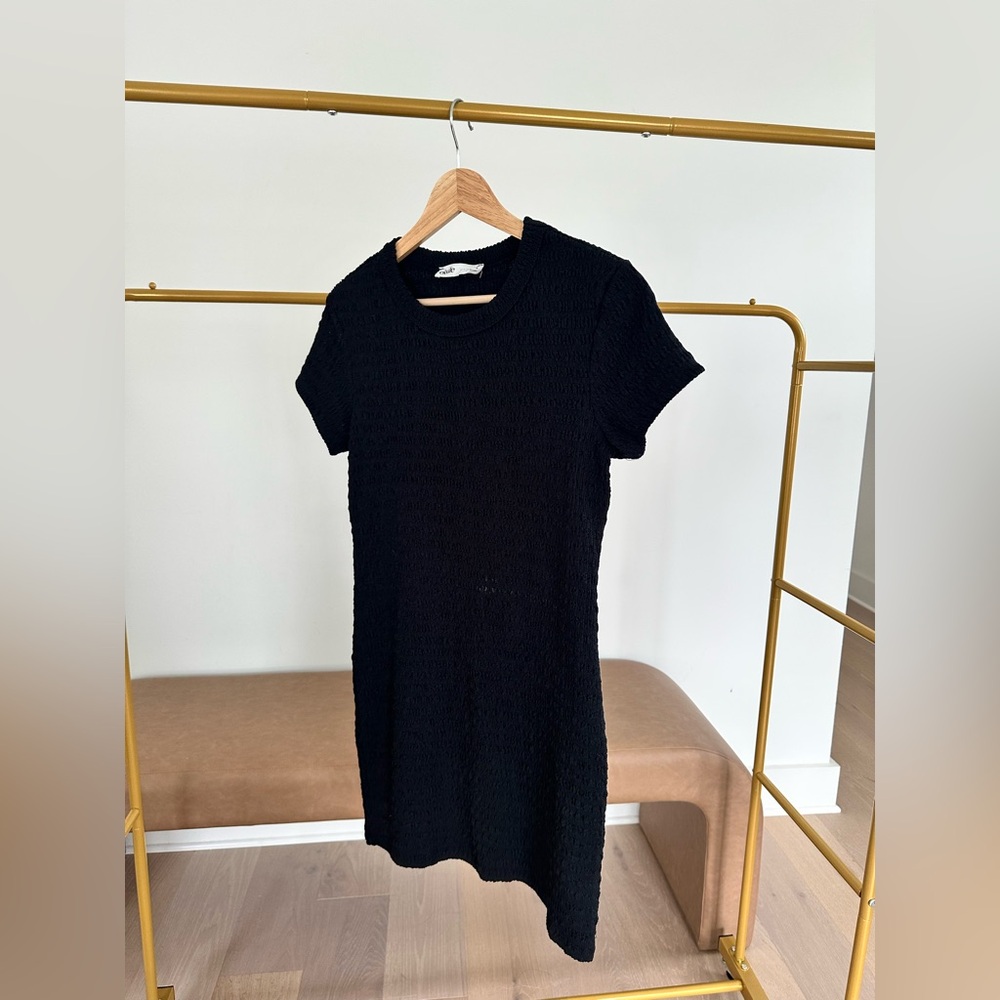 Elodie Chic Black Textured Mini Dress